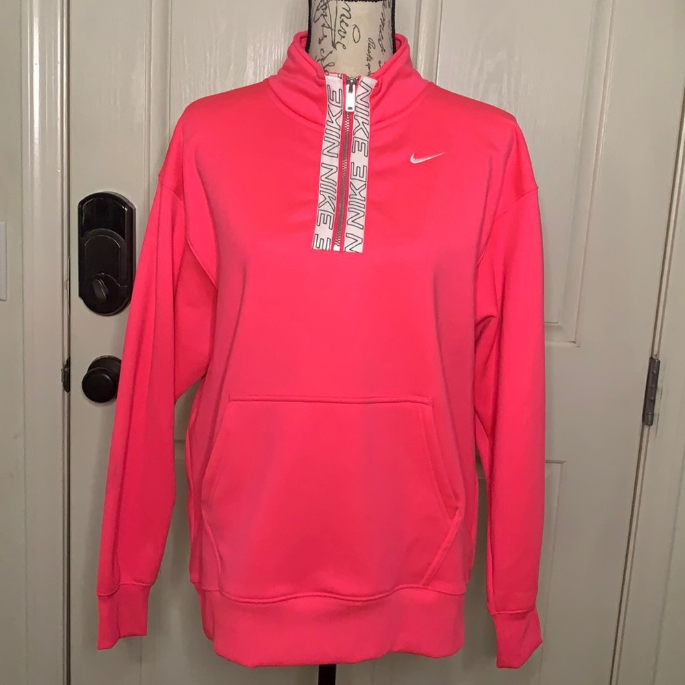 {Nike} hot pink sweatshirt.